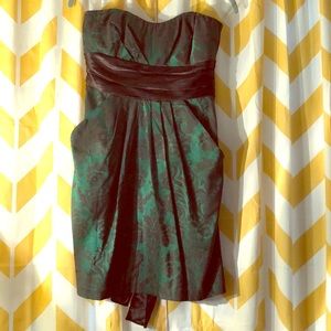 Black and green strapless dress